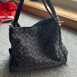 Black and gray coach purse